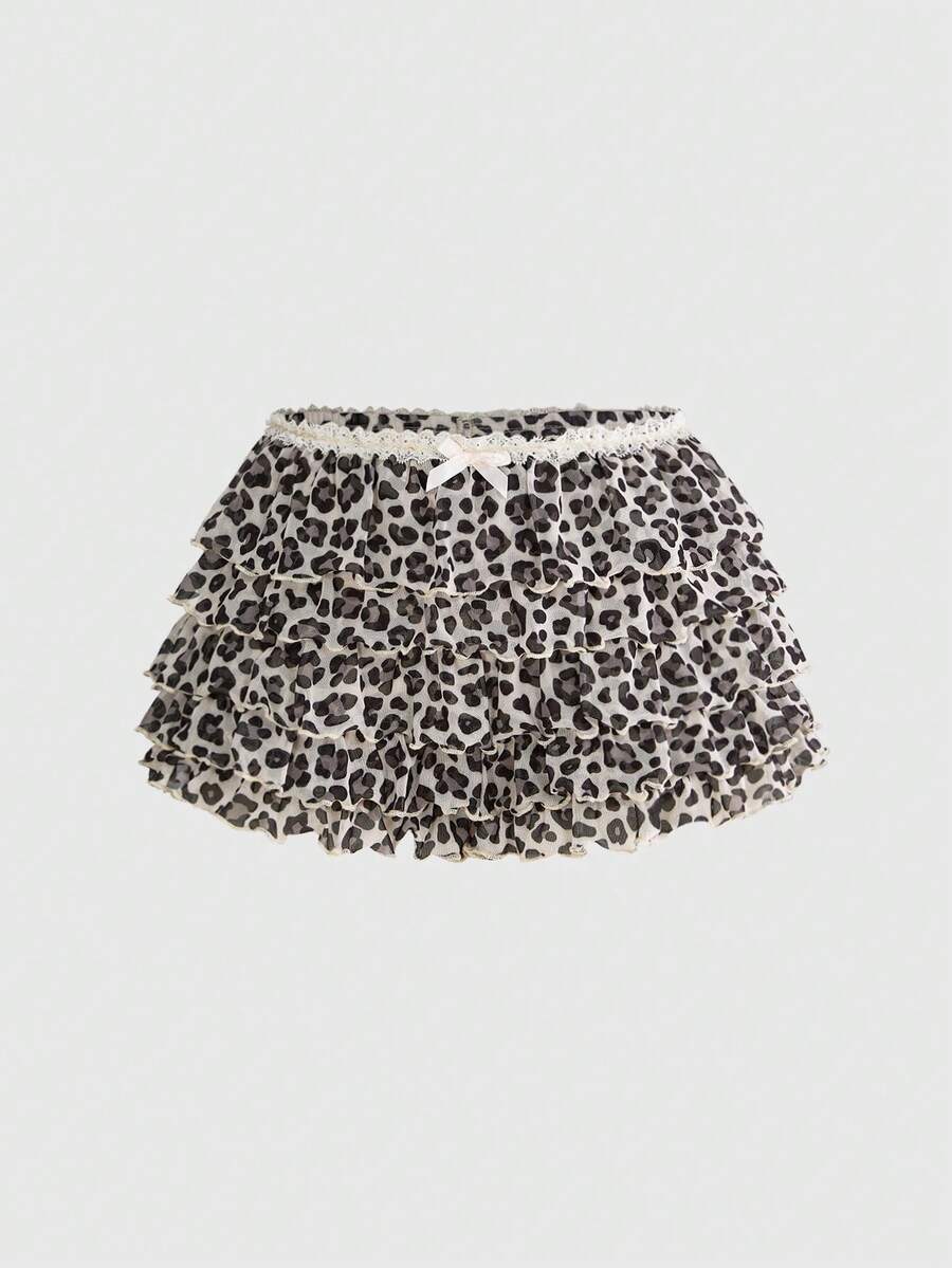 Y2K leopard print two-piece outfit with strapless bandeau top and ruffle mini shorts, featuring contrast lace and a slim fit