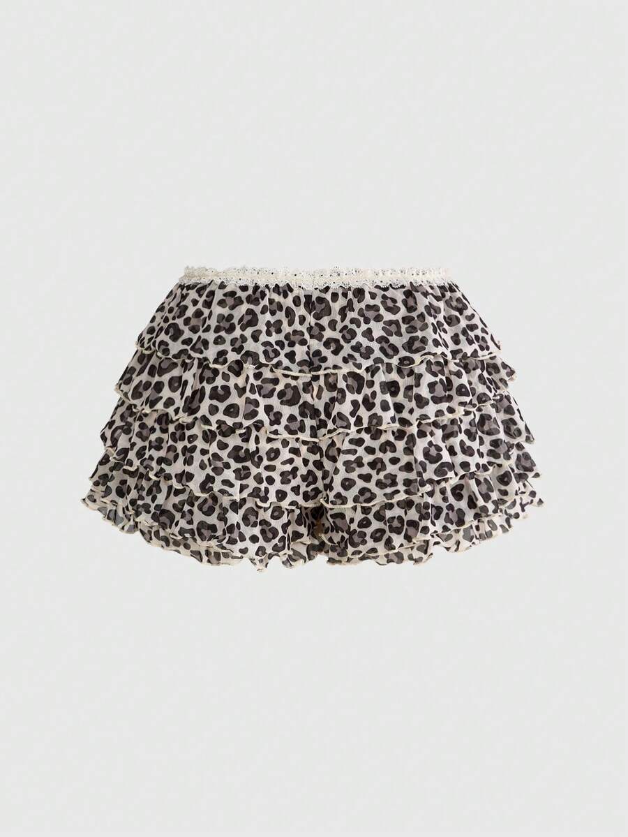 Y2K leopard print two-piece outfit with strapless bandeau top and ruffle mini shorts, featuring contrast lace and a slim fit