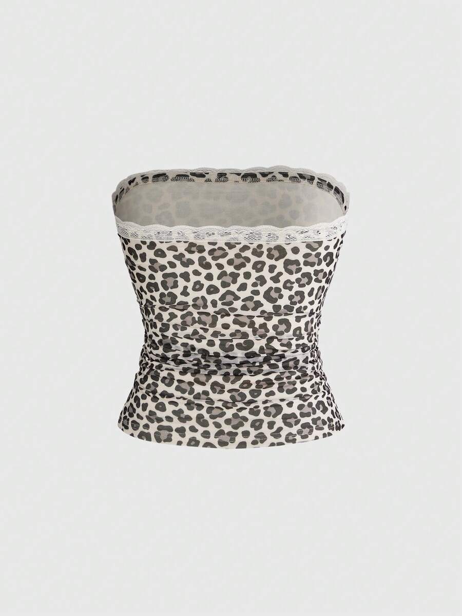 Y2K leopard print two-piece outfit with strapless bandeau top and ruffle mini shorts, featuring contrast lace and a slim fit