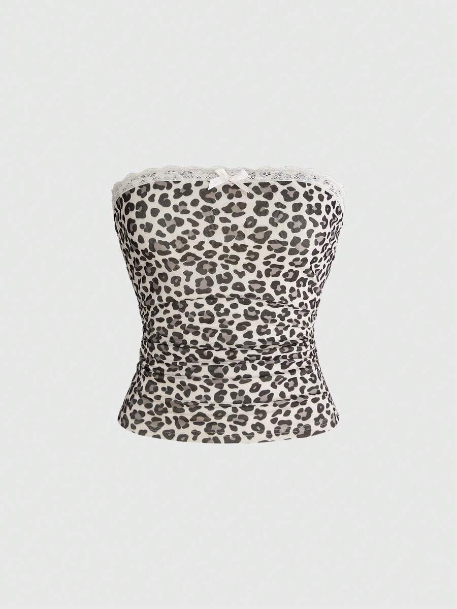 Y2K leopard print two-piece outfit with strapless bandeau top and ruffle mini shorts, featuring contrast lace and a slim fit
