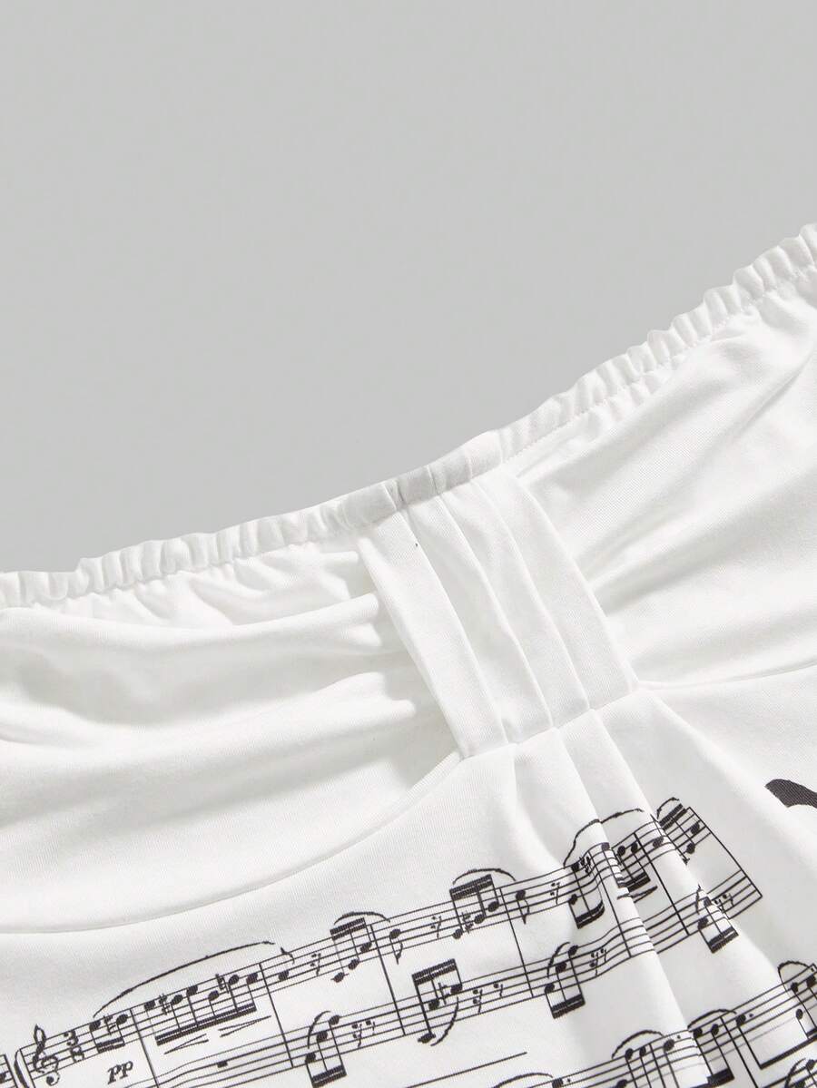 Women's striped strapless tube top featuring ruched detailing, flared hem, and stretchy knit fabric.