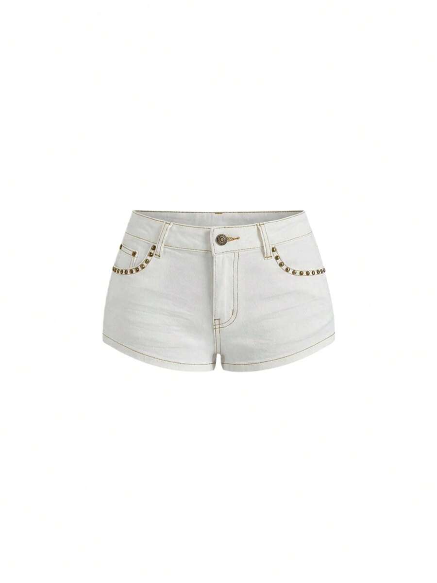 Women's Y2K low waist distressed shorts featuring butterfly studded details, pockets, and a zipper fly closure.