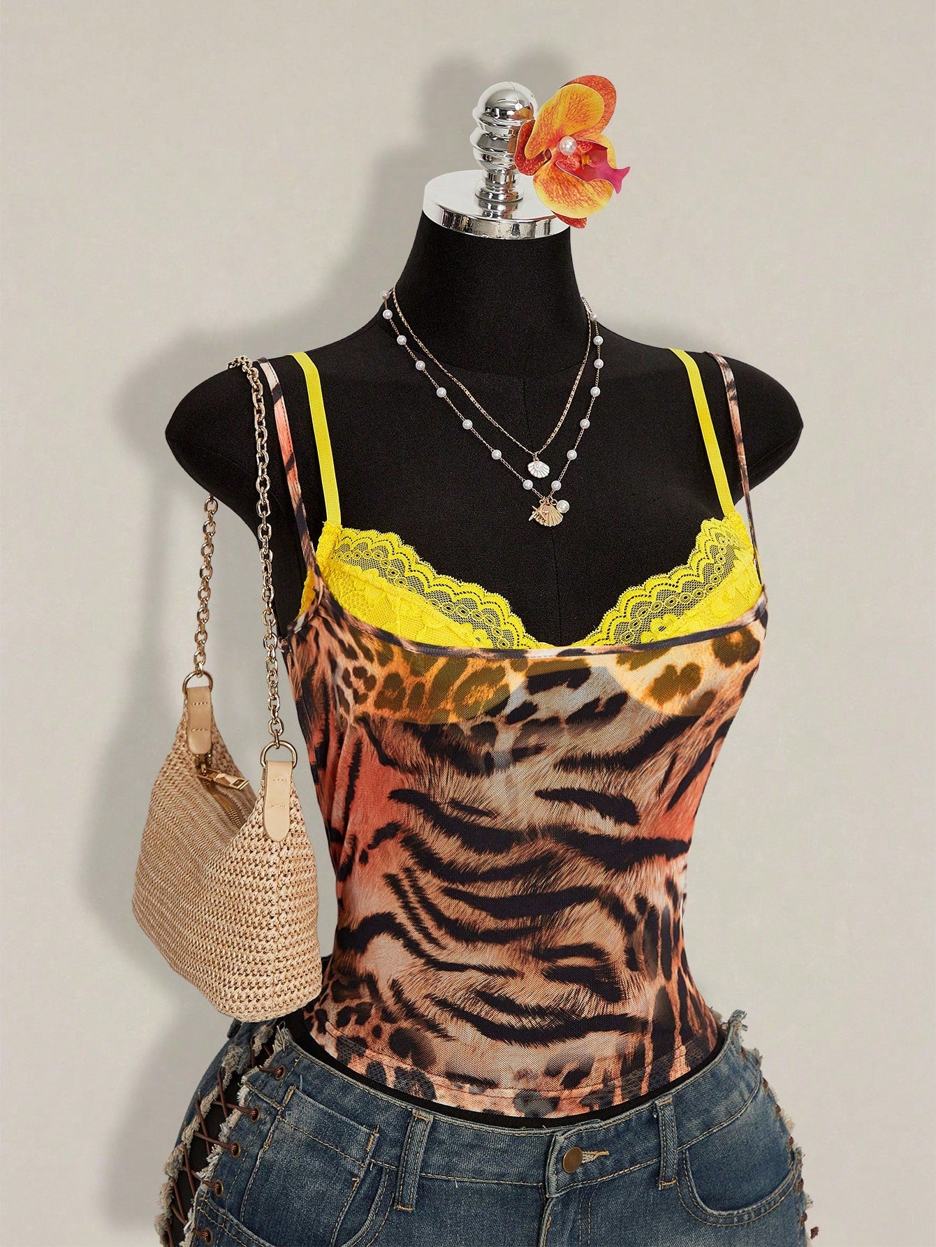 Women's grey leopard print spaghetti strap cami with black contrast lace trim and slim fit design