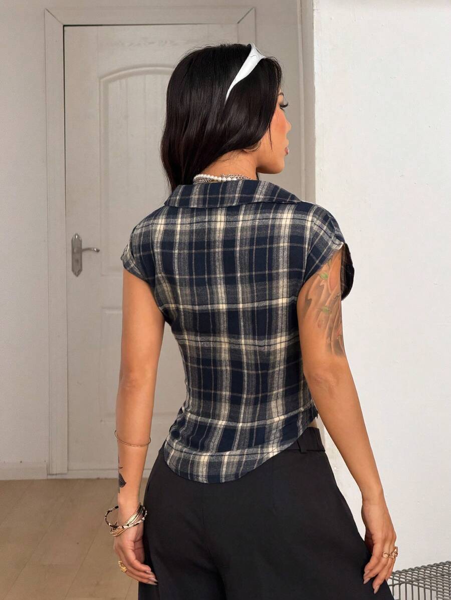 Women's plaid short sleeve shirt featuring a lapel collar and backless design in woven fabric.