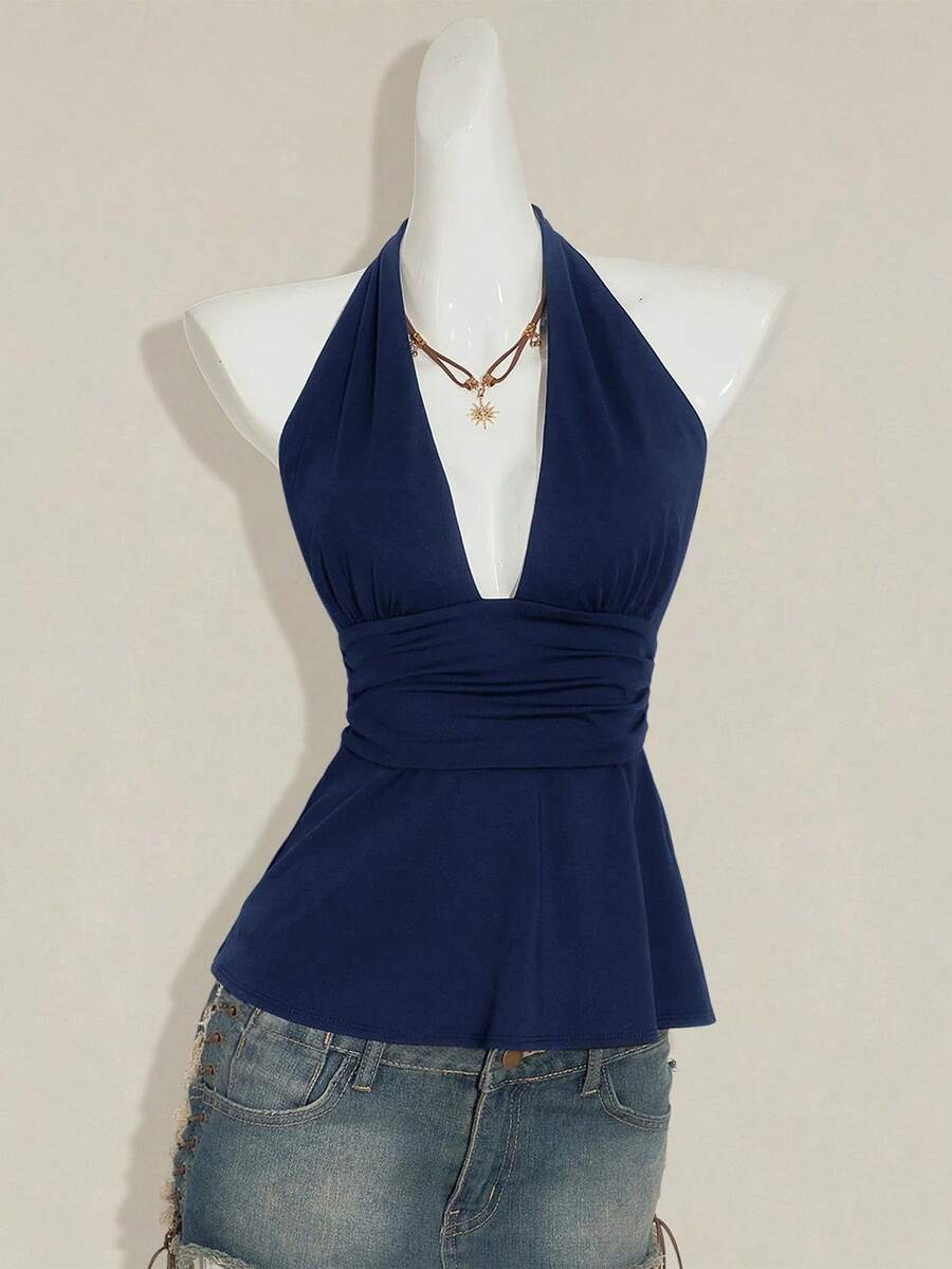 Women's backless halter babydoll tank top featuring a square neckline, slim fit silhouette, and a flared ruffle hem.