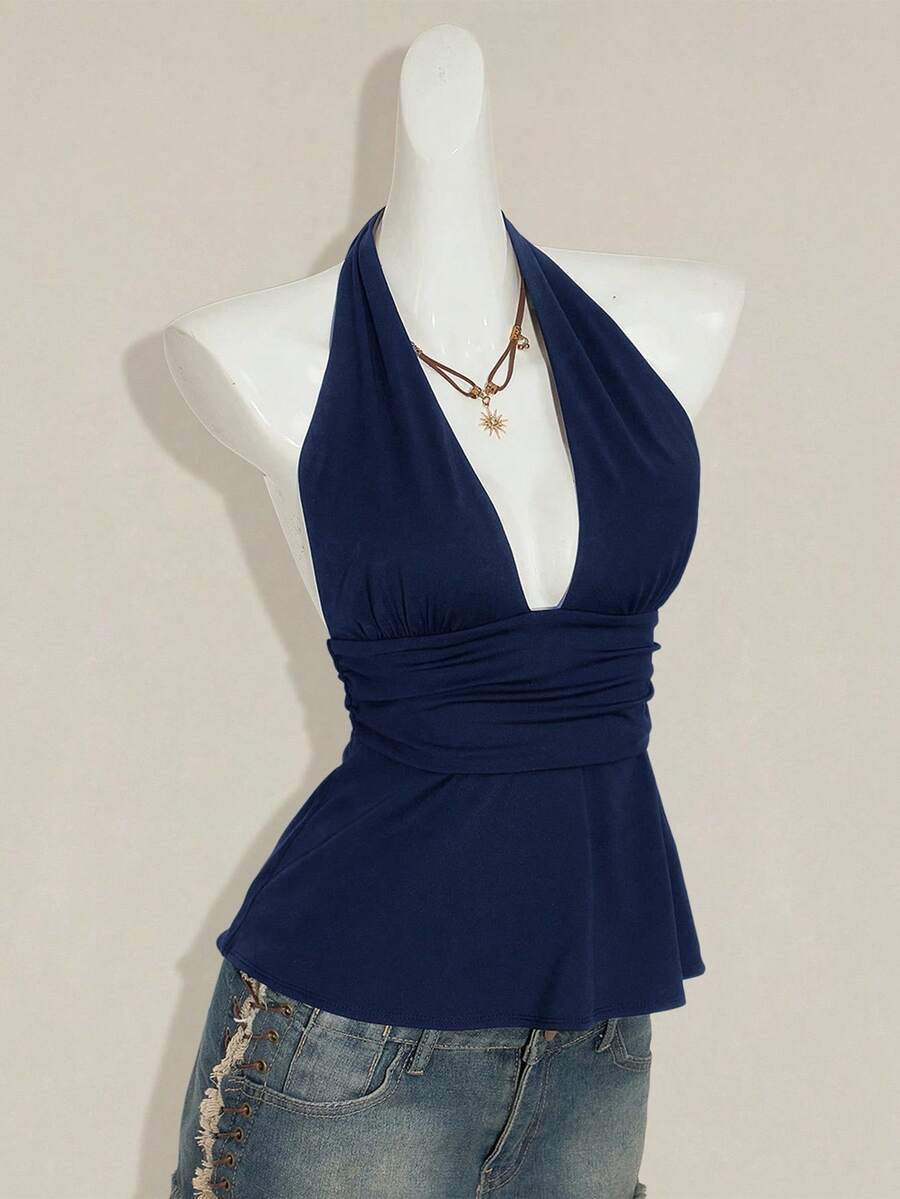 Women's backless halter babydoll tank top featuring a square neckline, slim fit silhouette, and a flared ruffle hem.