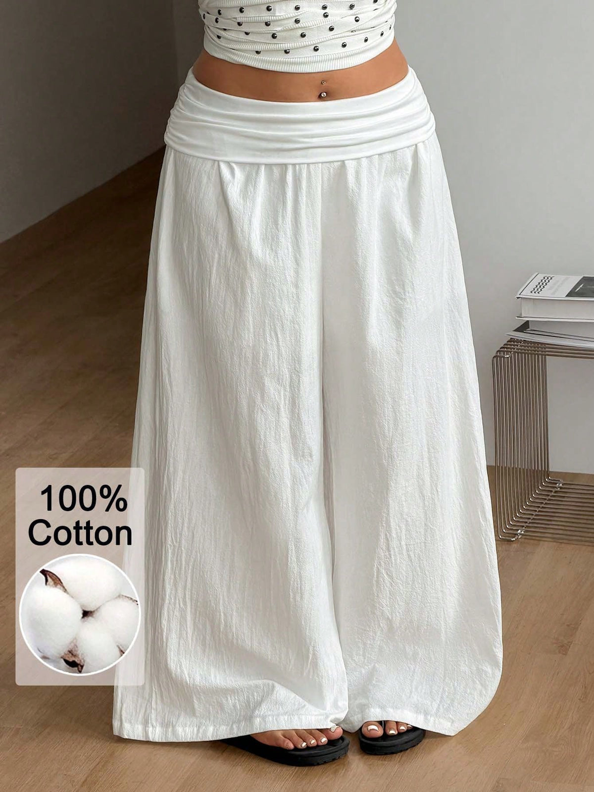 Women's plus size wide leg cotton pants featuring a relaxed loose fit and high waist design.