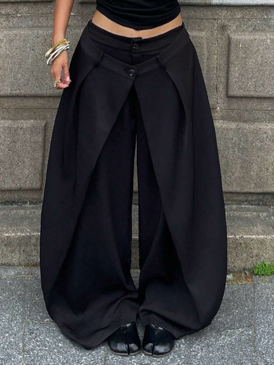 Women's loose fit pleated wide leg pants in royal blue pinstripe woven fabric with zipper fly closure.