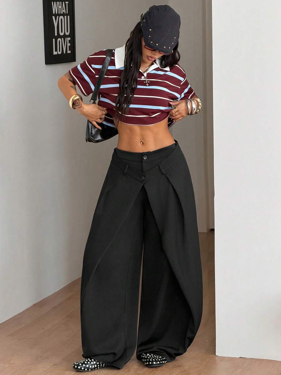 Women's loose fit pleated wide leg pants in royal blue pinstripe woven fabric with zipper fly closure.