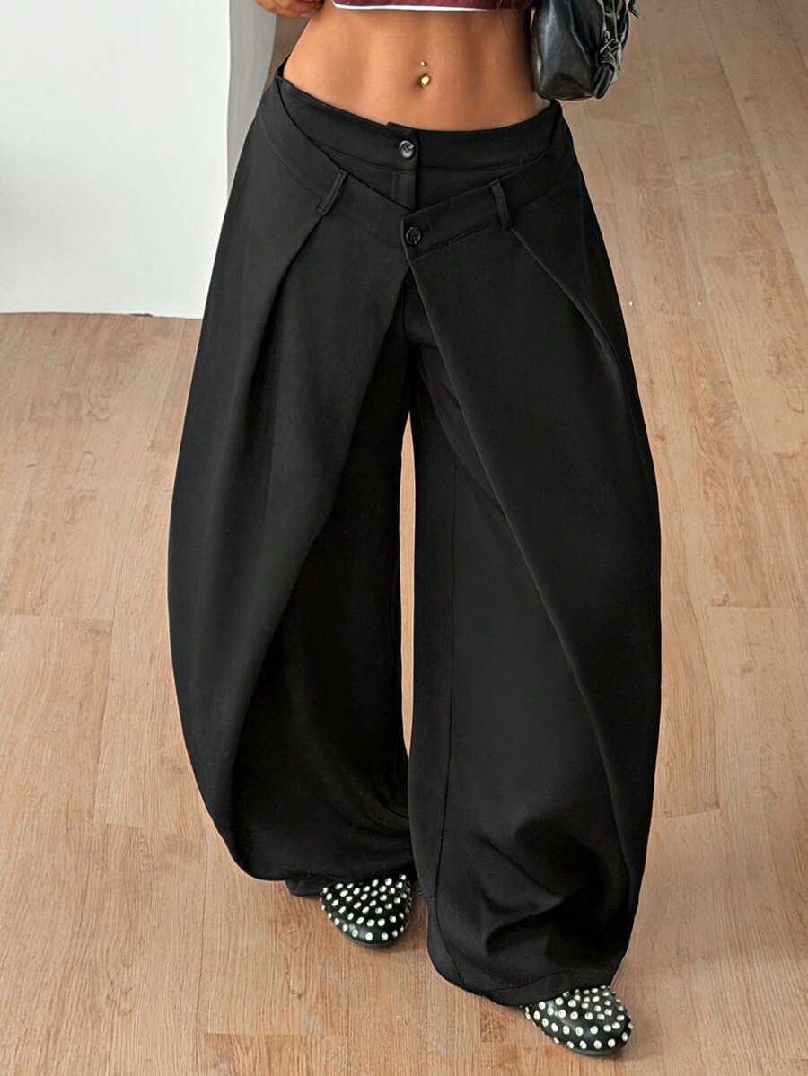 Women's loose fit pleated wide leg pants in royal blue pinstripe woven fabric with zipper fly closure.