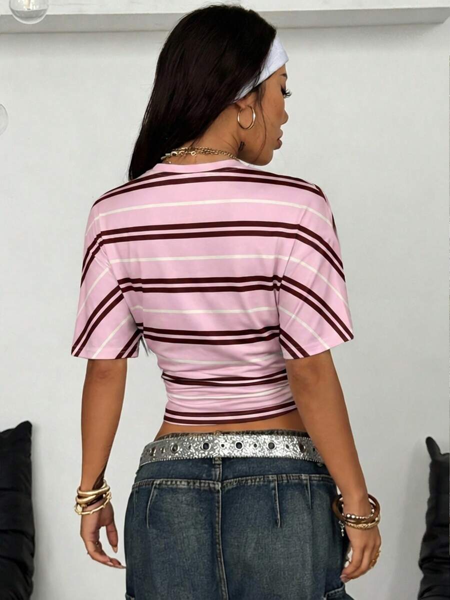 Women's striped short sleeve t-shirt featuring a casual drop shoulder design and round neckline.