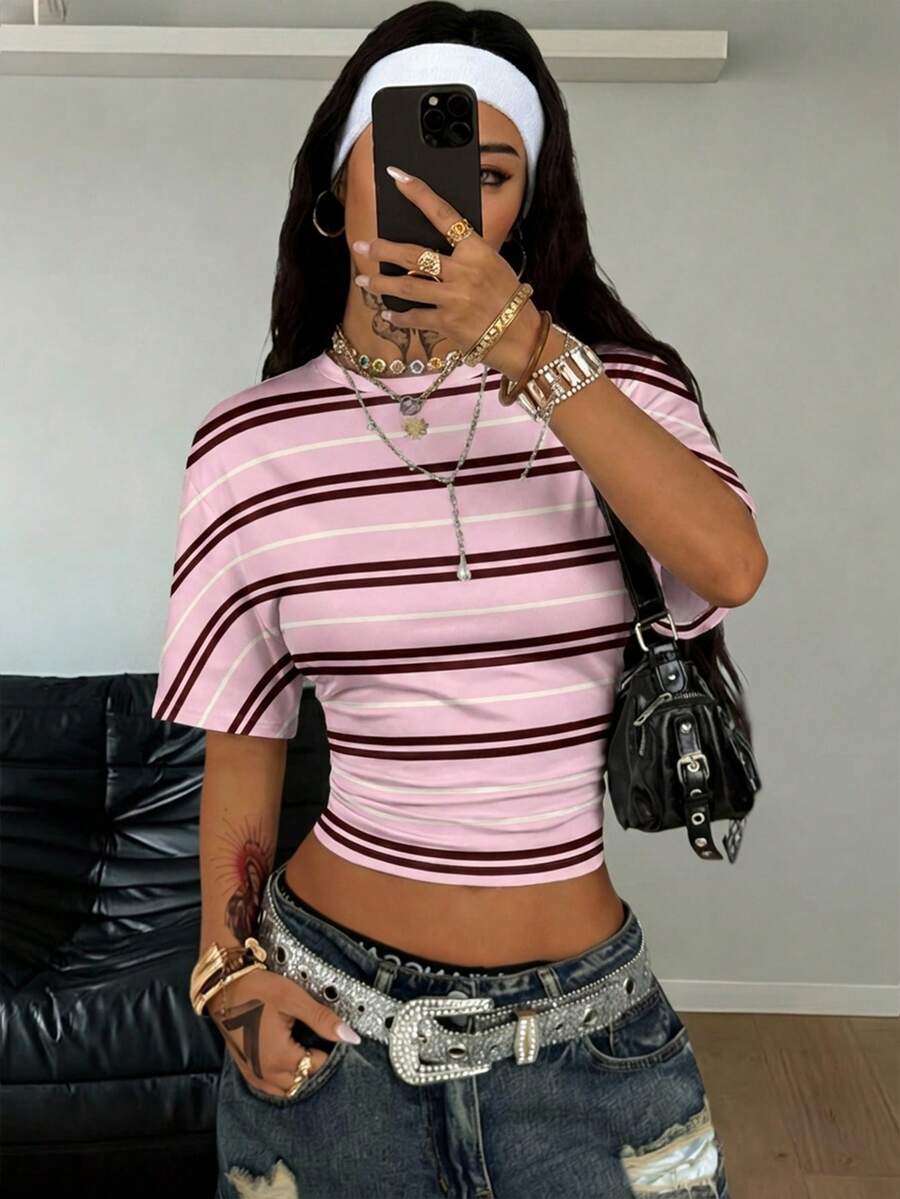 Women's striped short sleeve t-shirt featuring a casual drop shoulder design and round neckline.