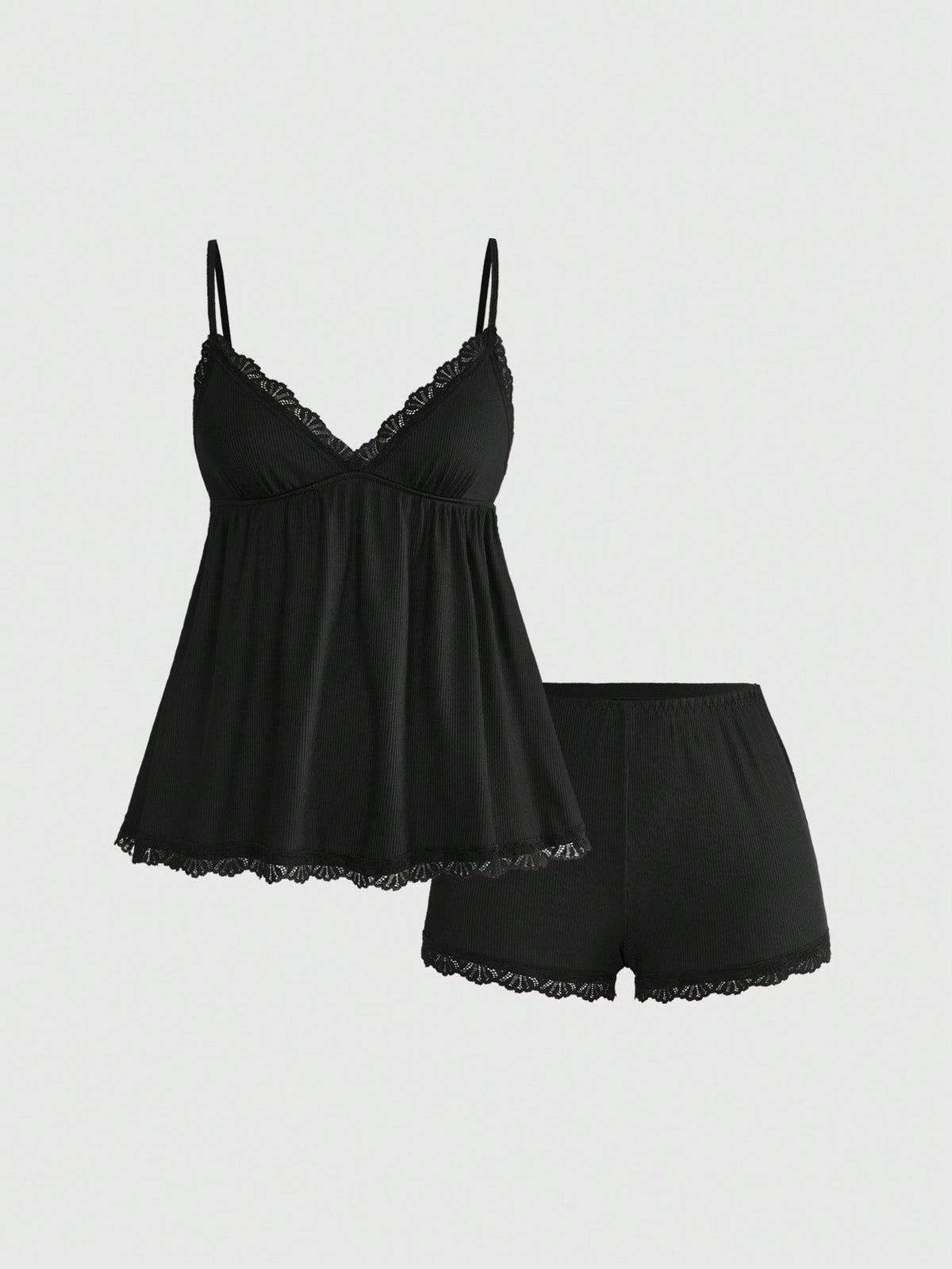 Ribbed lace camisole and shorts pajama set with spaghetti straps, bow detail, and contrast lace trim