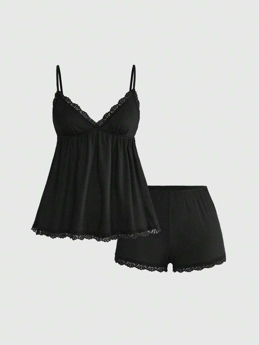Ribbed lace camisole and shorts pajama set with spaghetti straps, bow detail, and contrast lace trim