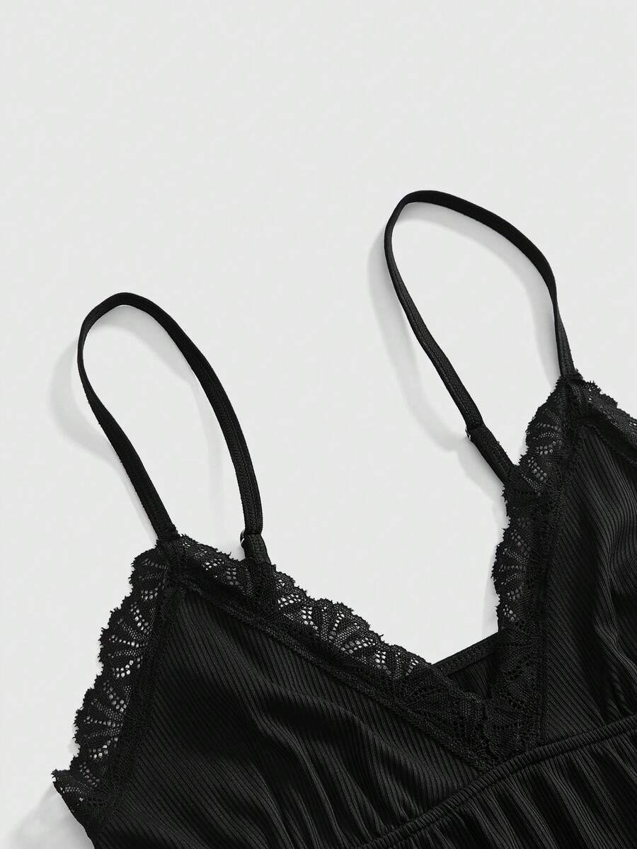 Ribbed lace camisole and shorts pajama set with spaghetti straps, bow detail, and contrast lace trim
