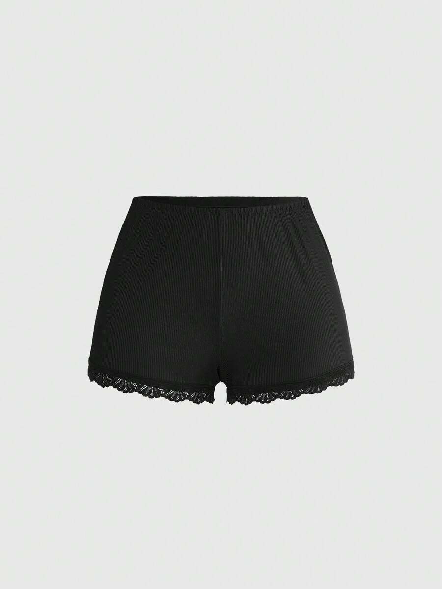 Ribbed lace camisole and shorts pajama set with spaghetti straps, bow detail, and contrast lace trim