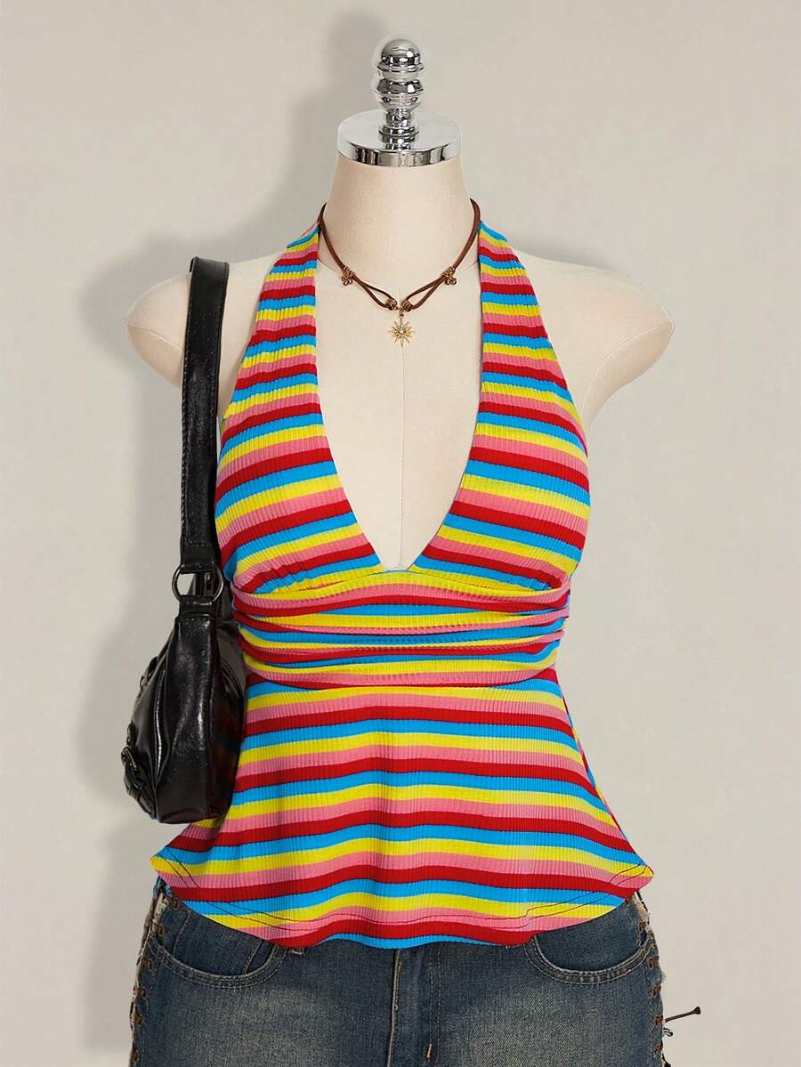 Women's backless halter babydoll tank top featuring a square neckline, slim fit silhouette, and a flared ruffle hem.