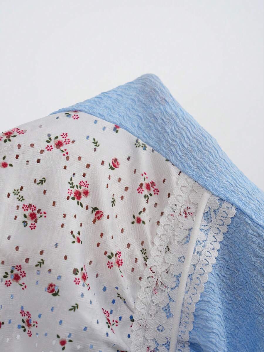 White ditsy floral women's square neck short sleeve t-shirt featuring puff sleeves, frill details, and a slim fit flared hem.