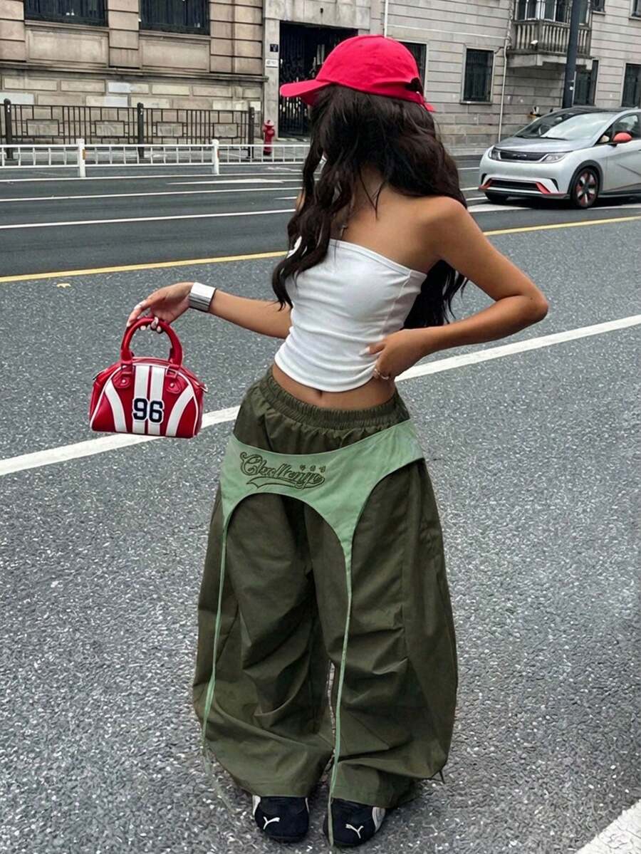 Women's casual wide leg long pants featuring an elastic drawstring waistband and loose fit silhouette.