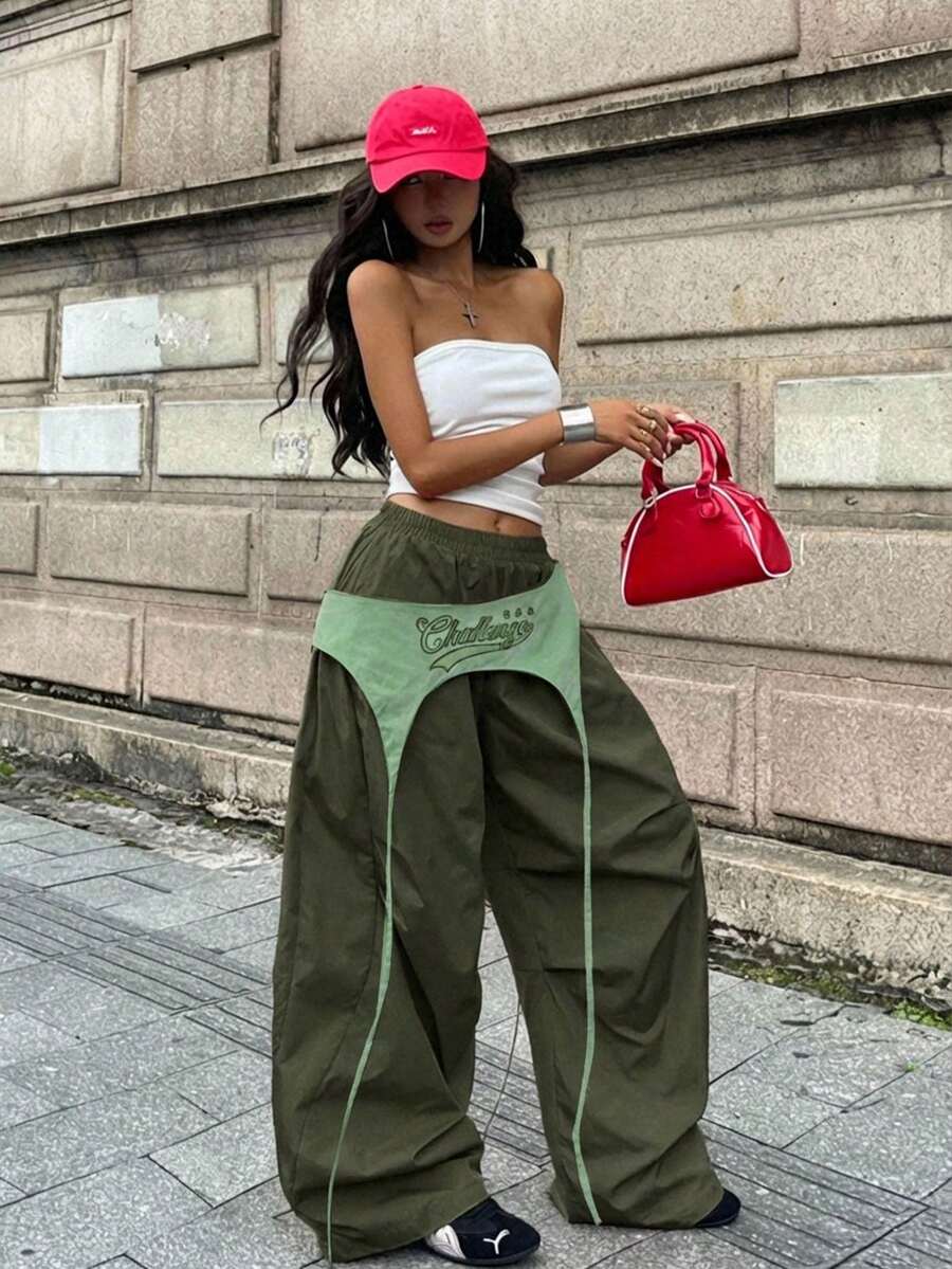 Women's casual wide leg long pants featuring an elastic drawstring waistband and loose fit silhouette.