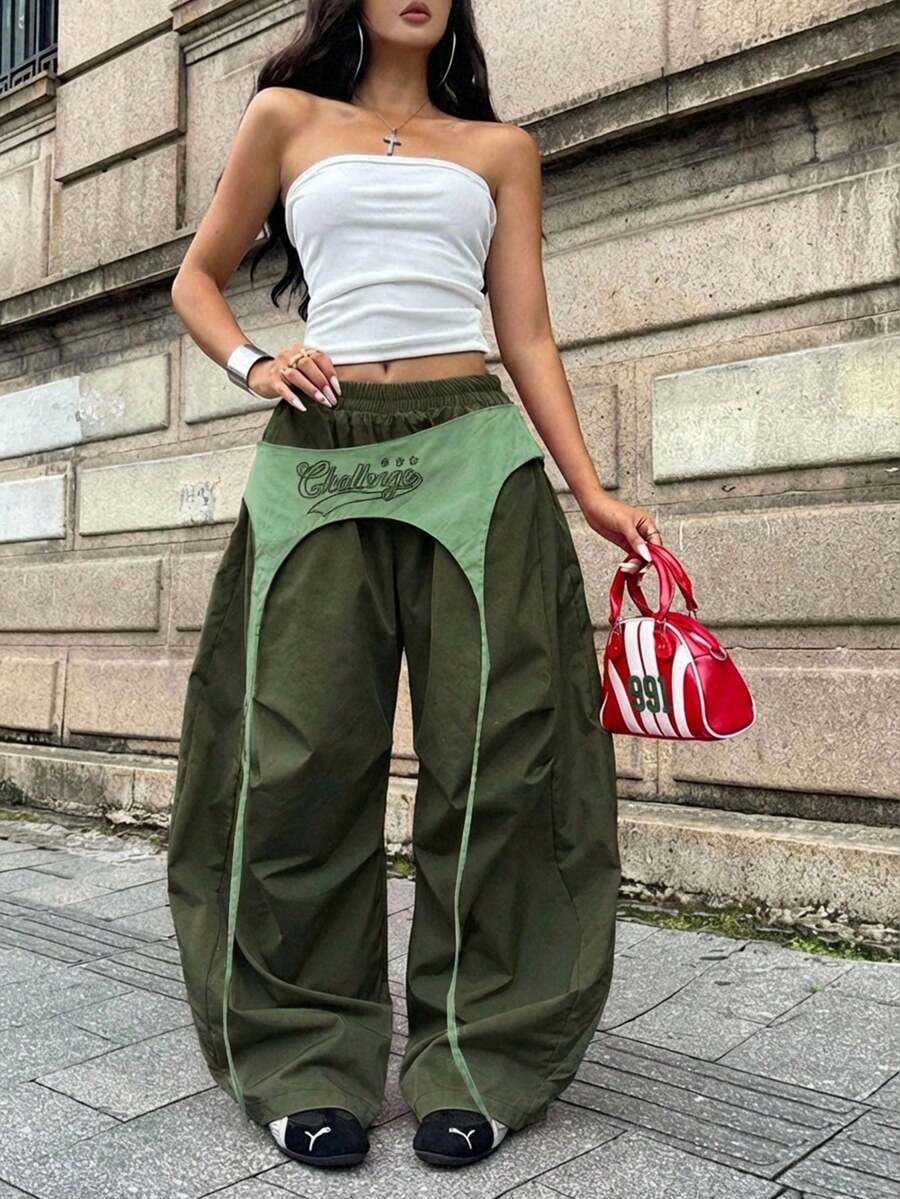 Women's casual wide leg long pants featuring an elastic drawstring waistband and loose fit silhouette.
