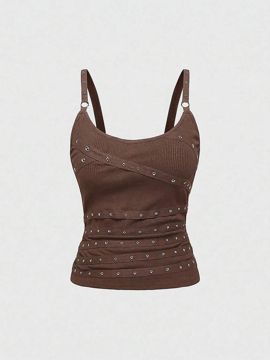 Women's wide-strap cami top featuring a grunge punk design with cut-out details, rhinestone embellishments, and grommet eyelets.