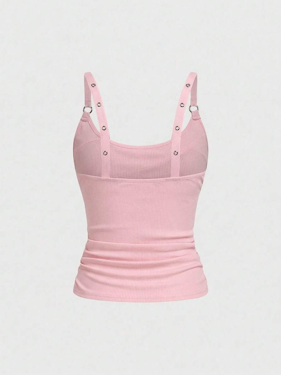 Women's wide-strap cami top featuring a grunge punk design with cut-out details, rhinestone embellishments, and grommet eyelets.