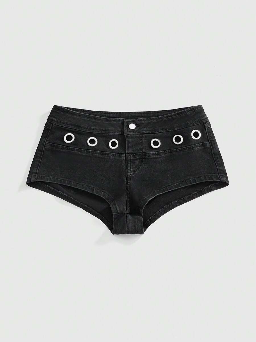 Women's ultra low waist camouflage mini skort shorts with zipper fly, button detail, and grommet eyelet accents.
