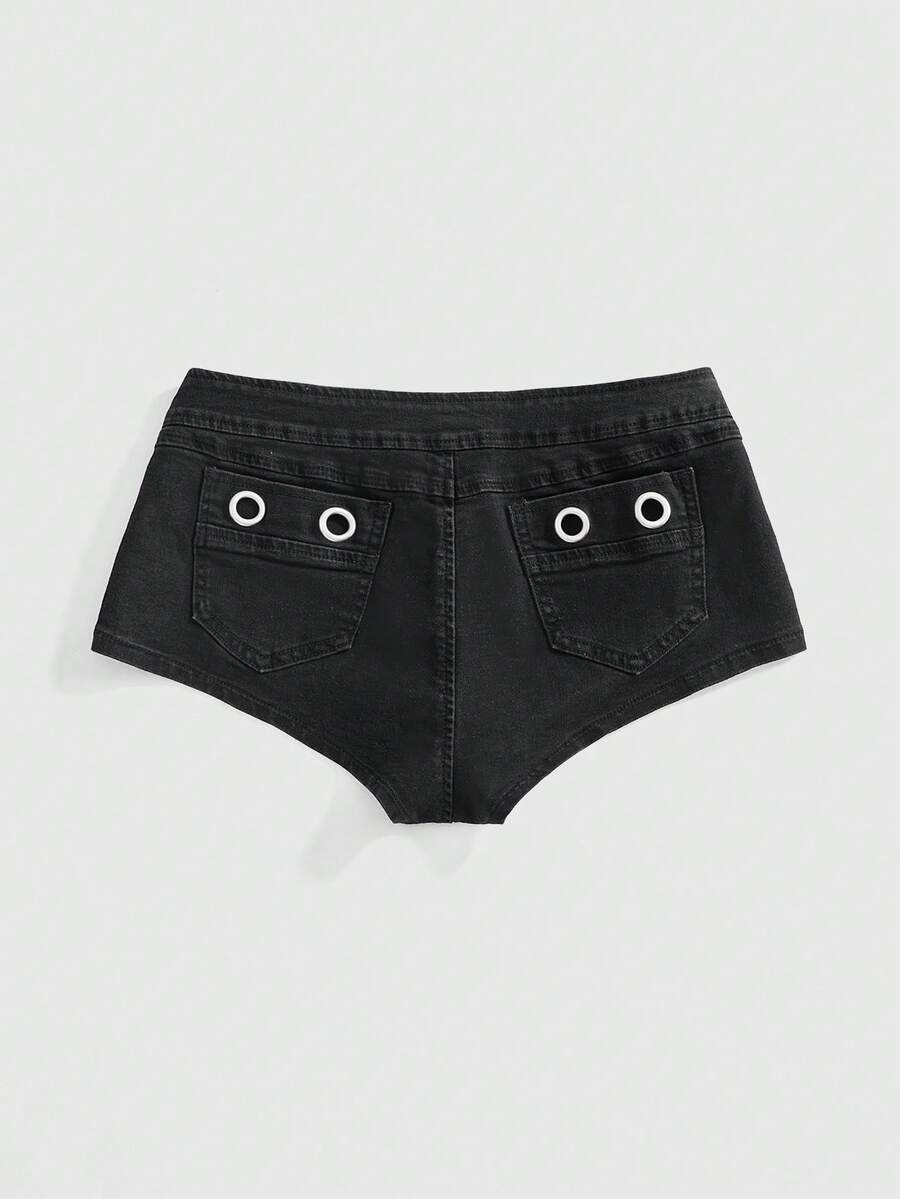 Women's ultra low waist camouflage mini skort shorts with zipper fly, button detail, and grommet eyelet accents.