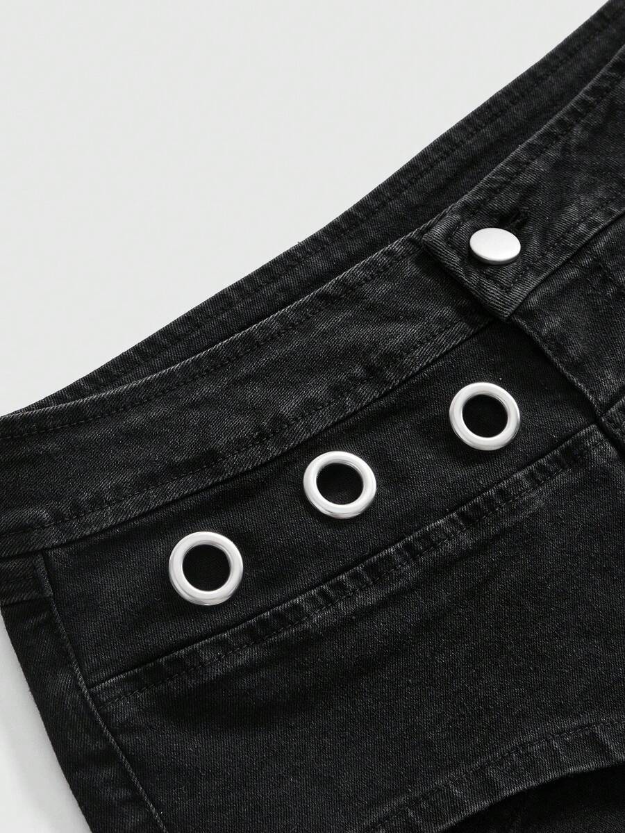 Women's ultra low waist camouflage mini skort shorts with zipper fly, button detail, and grommet eyelet accents.