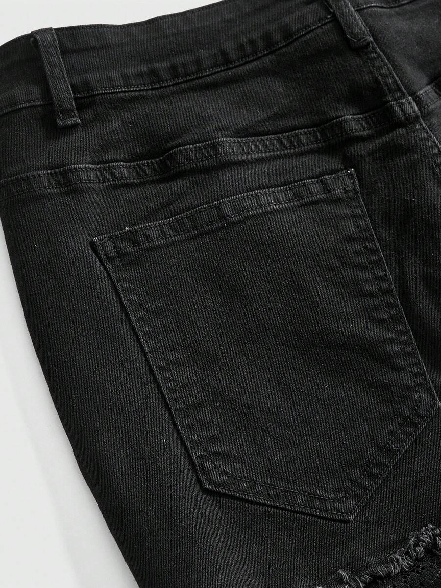 Front view of a women's plus size denim mini skirt with contrast lace trim and a fitted silhouette.