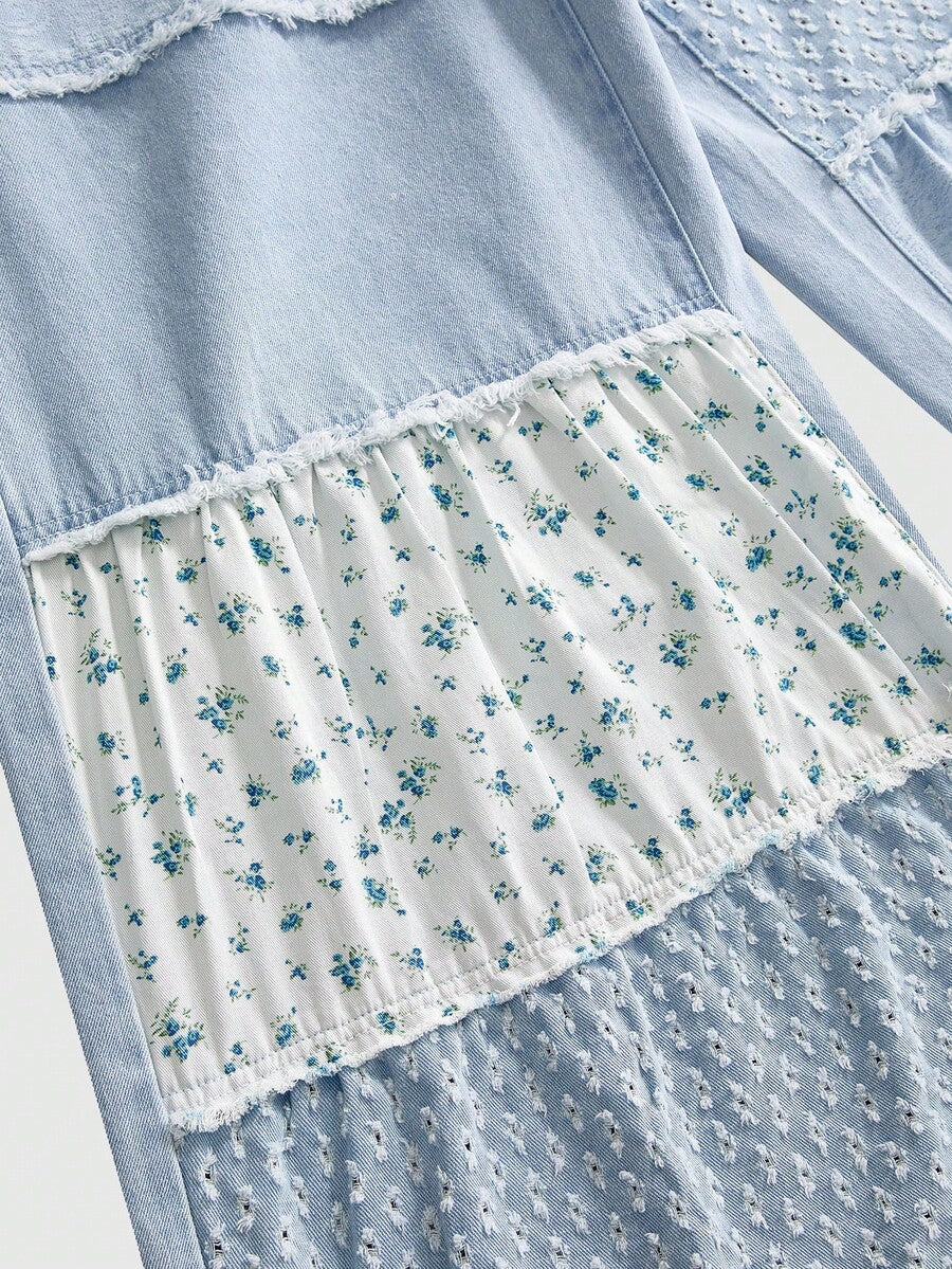 Women's plus size baby blue patchwork denim jeans featuring a loose straight leg cut, zipper fly, and pocket detailing.
