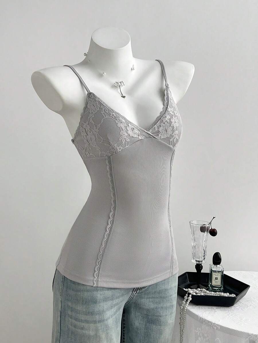 Women's slim fit backless cami tank top with contrast lace patchwork details, spaghetti straps, and high-stretch knitted ribbed fabric.