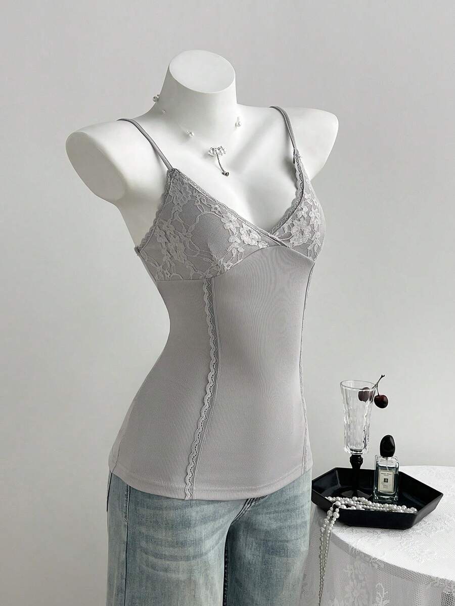 Women's slim fit backless cami tank top with contrast lace patchwork details, spaghetti straps, and high-stretch knitted ribbed fabric.
