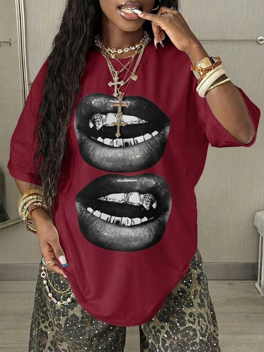 Women's oversized graphic crew neck t-shirt made of 100% white cotton knitted fabric with drop shoulder half sleeves.