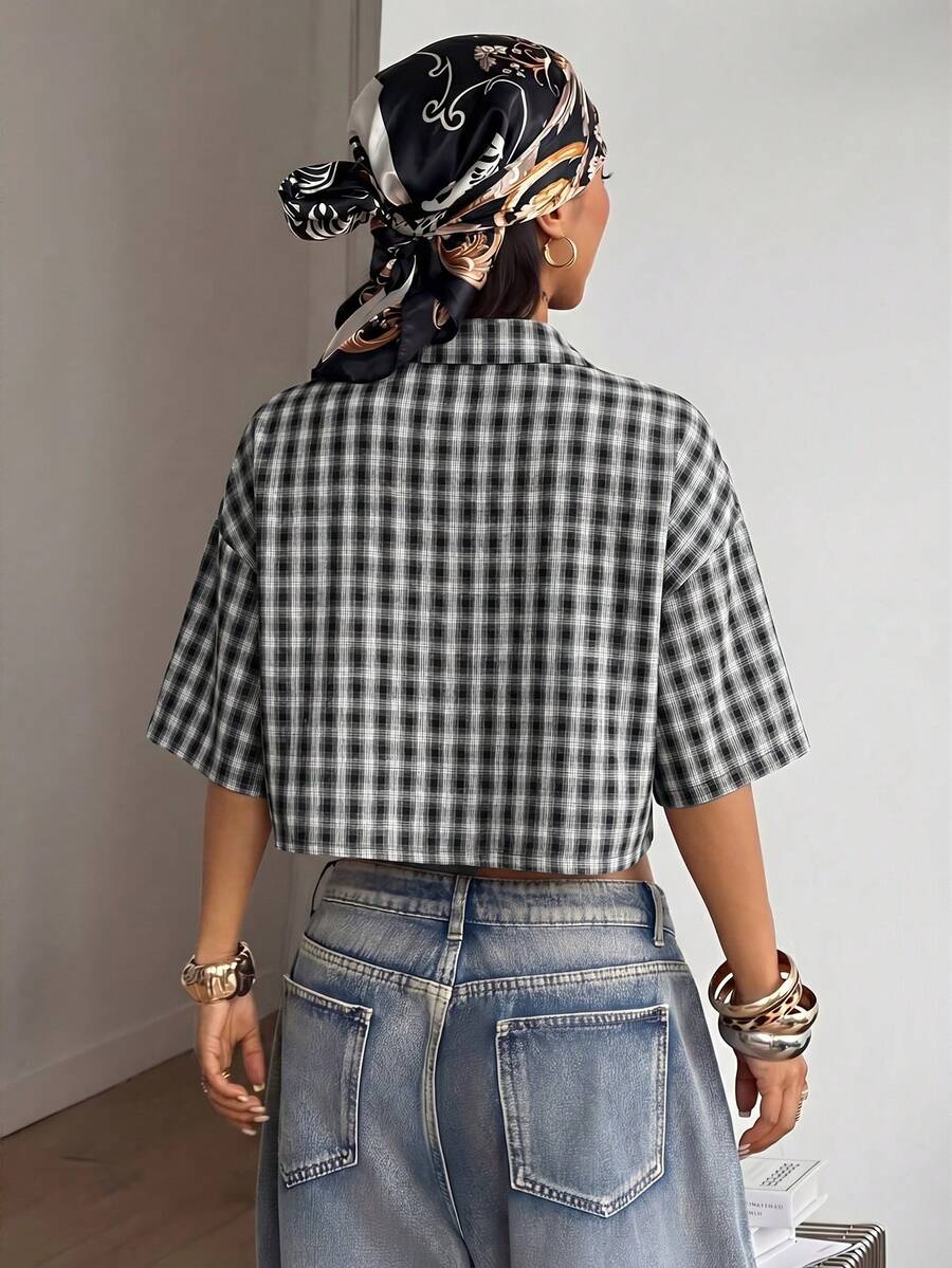 Women's plaid crop shirt with button front, chest pocket, short sleeves, and loose casual fit.