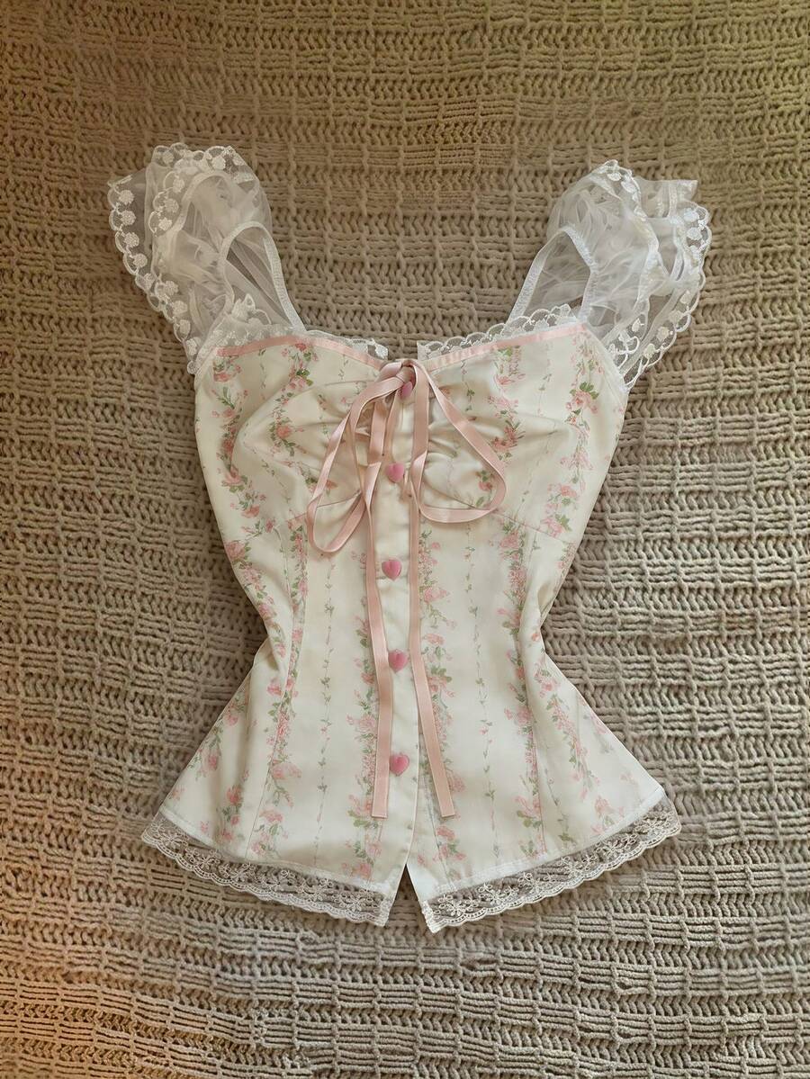 Vintage ditsy floral print sleeveless women's blouse with square neck, ruffle trim, and slim fit style.