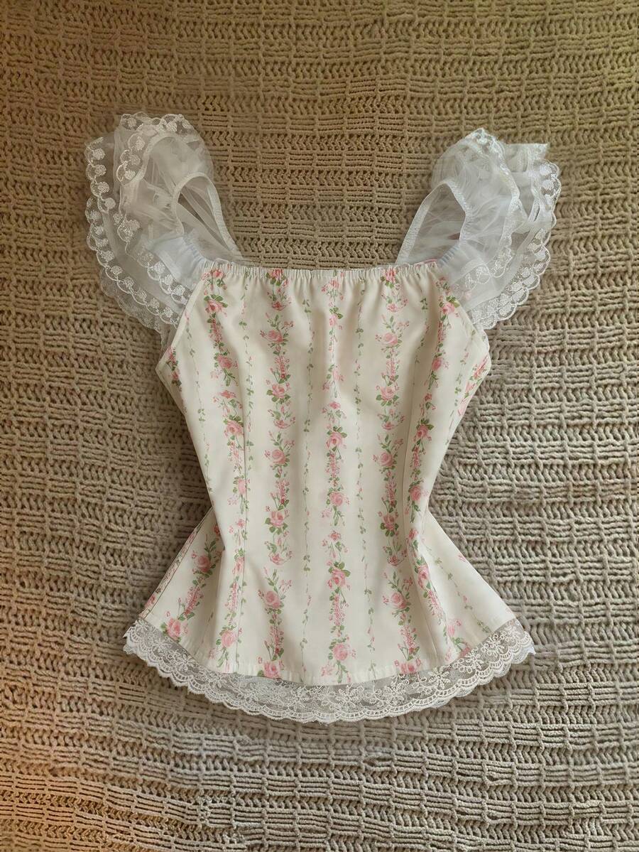 Vintage ditsy floral print sleeveless women's blouse with square neck, ruffle trim, and slim fit style.