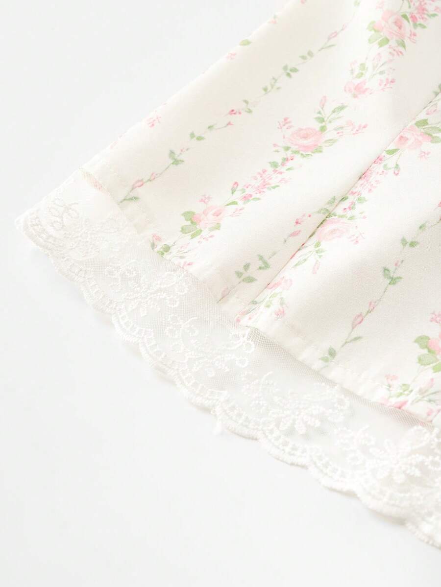 Vintage ditsy floral print sleeveless women's blouse with square neck, ruffle trim, and slim fit style.