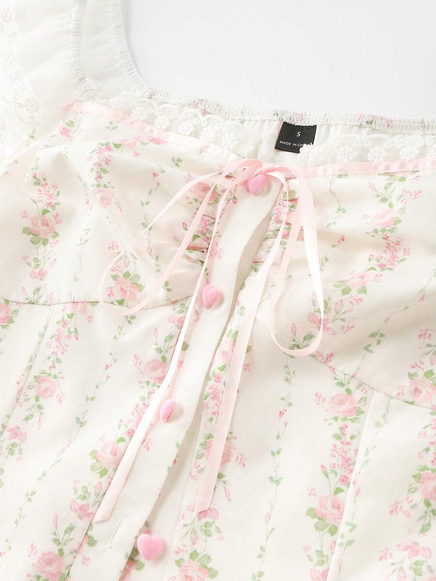 Vintage ditsy floral print sleeveless women's blouse with square neck, ruffle trim, and slim fit style.