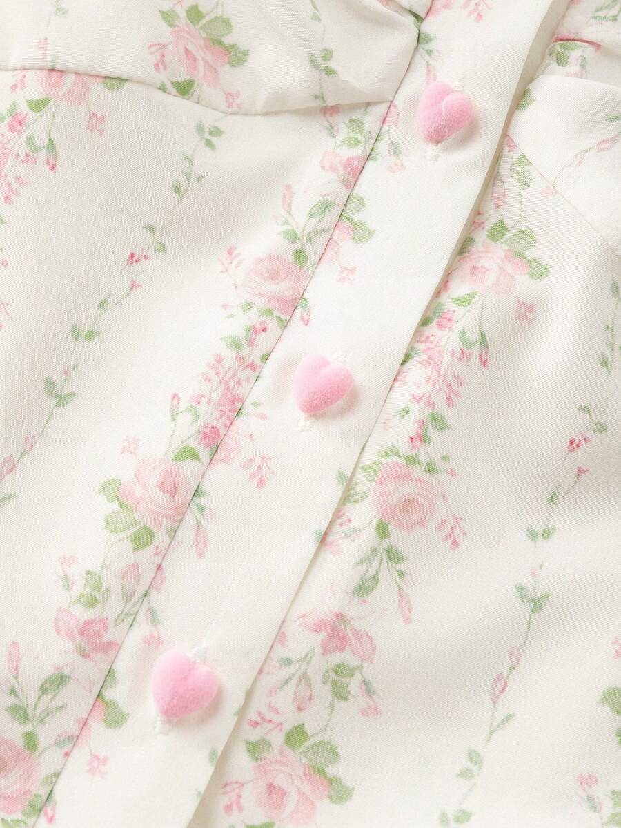 Vintage ditsy floral print sleeveless women's blouse with square neck, ruffle trim, and slim fit style.