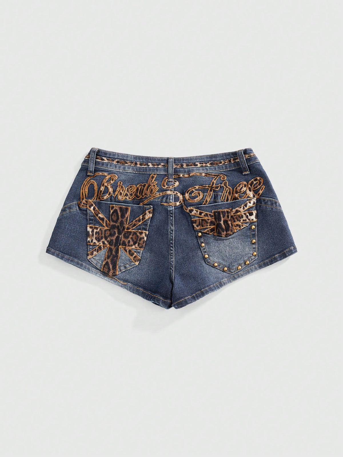 Women's super low waist shorts with leopard print embroidery, button and zipper closure, and raw hem detailing.