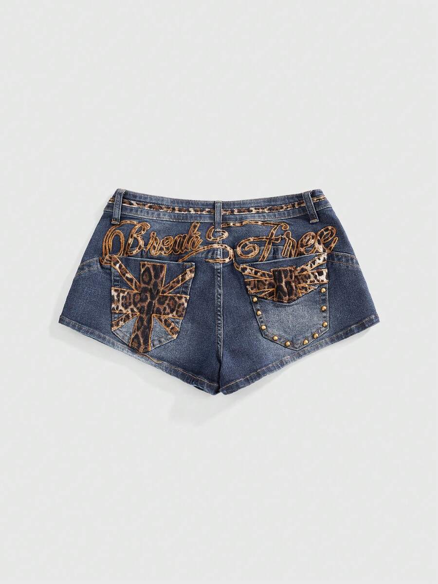 Women's super low waist shorts with leopard print embroidery, button and zipper closure, and raw hem detailing.