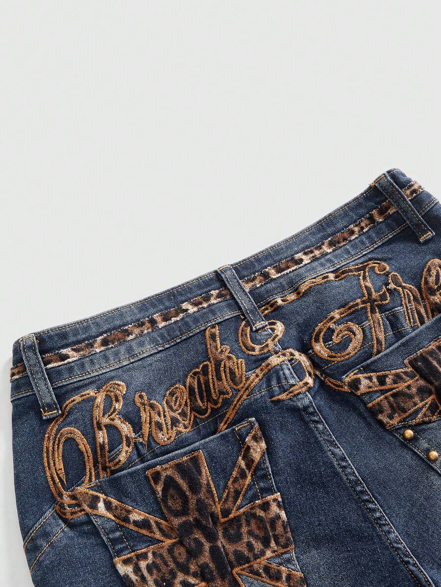 Women's super low waist shorts with leopard print embroidery, button and zipper closure, and raw hem detailing.