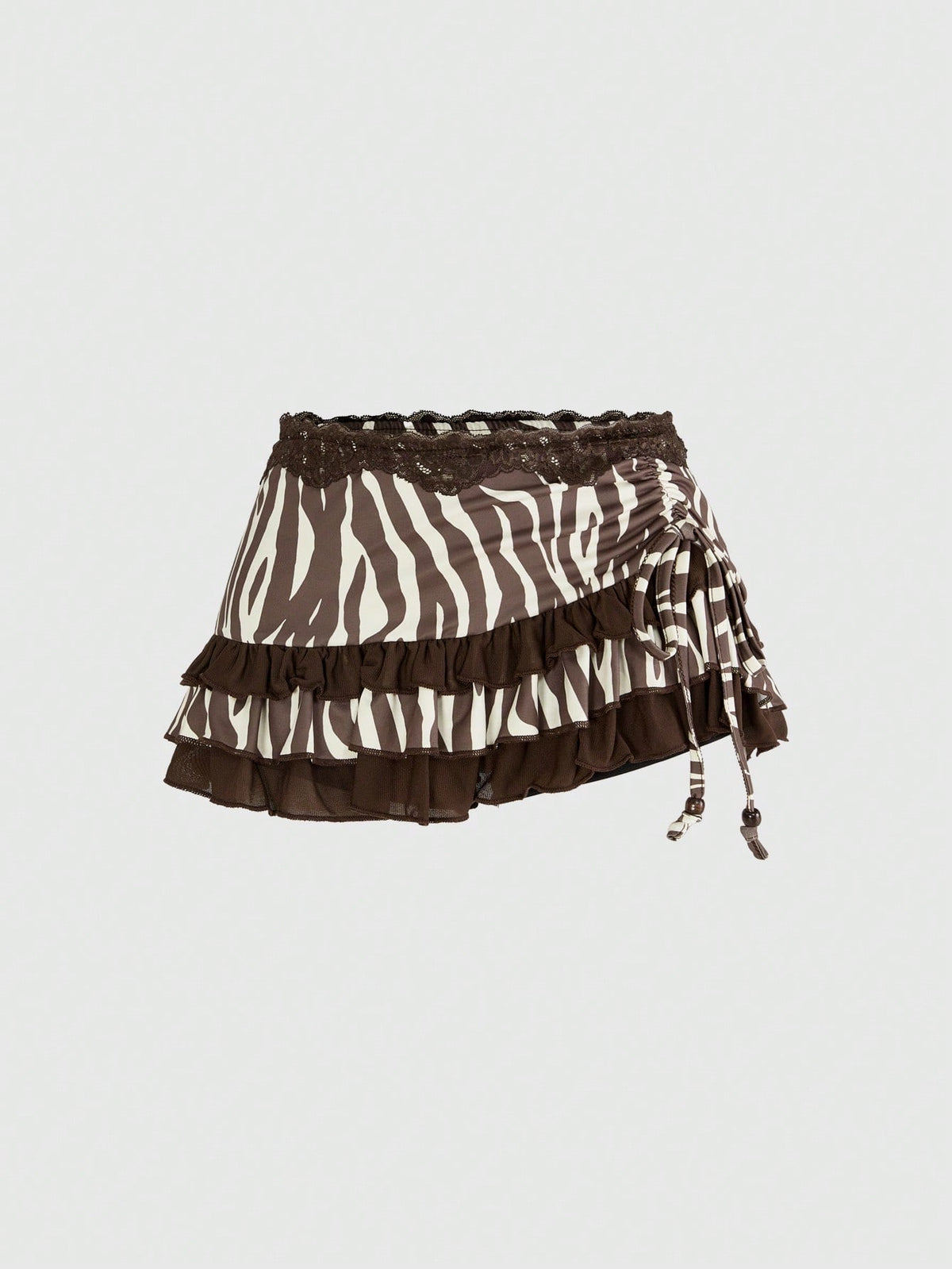 Women's black low-waist mini skirt with drawstring tie, ruched details, lace trim, layered ruffle hem, and asymmetric styling