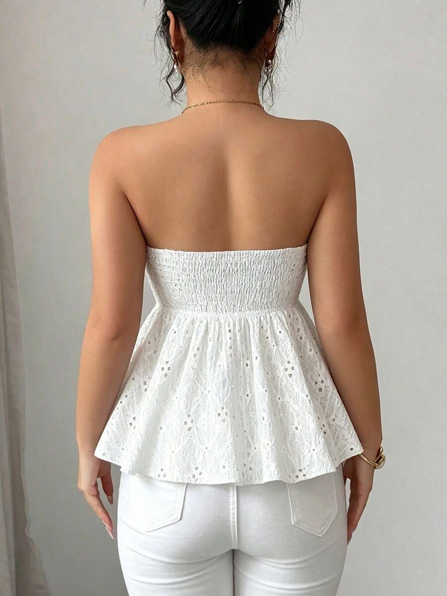 Elenzga white knitted sleeveless camisole top featuring spaghetti straps, front bow detail, hollow-out waist, and frill trim hem.