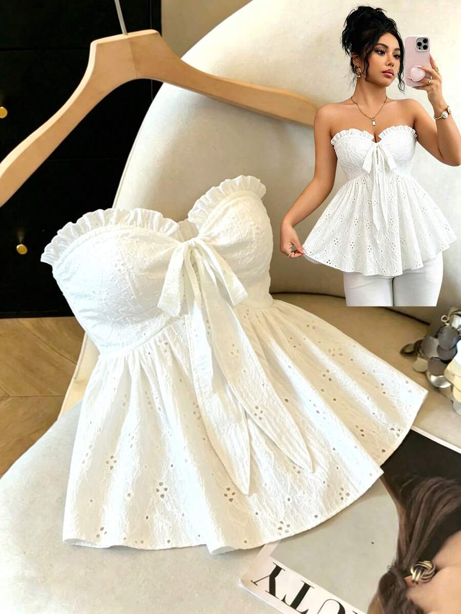 Elenzga white knitted sleeveless camisole top featuring spaghetti straps, front bow detail, hollow-out waist, and frill trim hem.