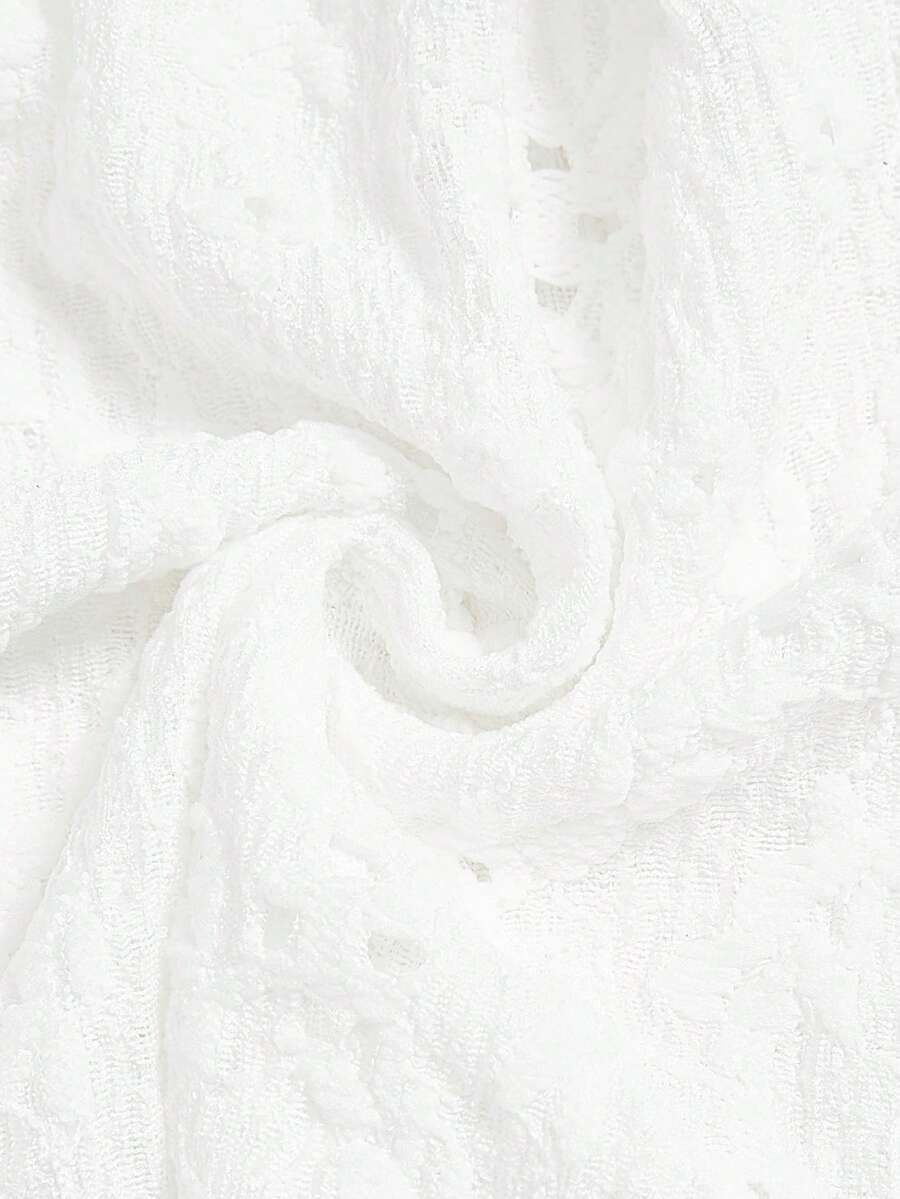 Elenzga white knitted sleeveless camisole top featuring spaghetti straps, front bow detail, hollow-out waist, and frill trim hem.