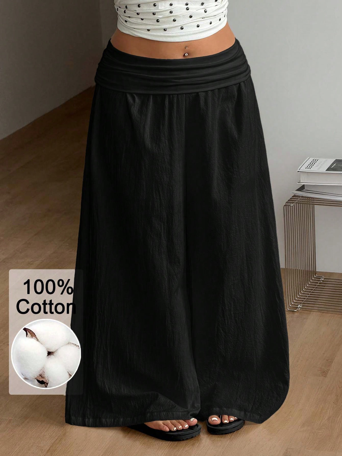 Women's plus size wide leg cotton pants featuring a relaxed loose fit and high waist design.
