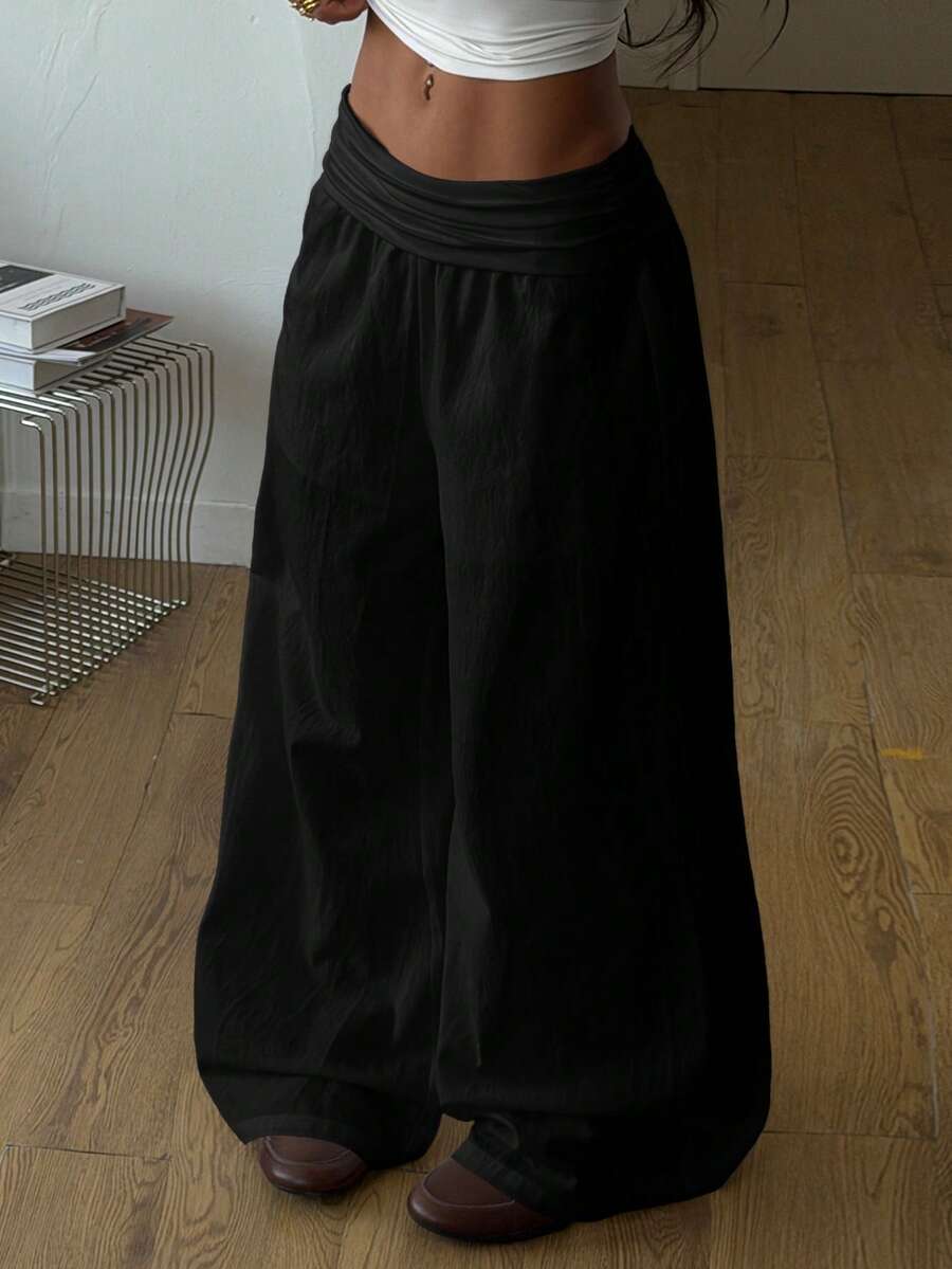 Women's plus size wide leg cotton pants featuring a relaxed loose fit and high waist design.